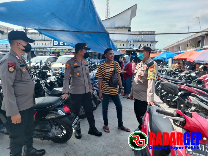 Kapolsek Tambang Pimpin Langsung Patroli ke Pasar